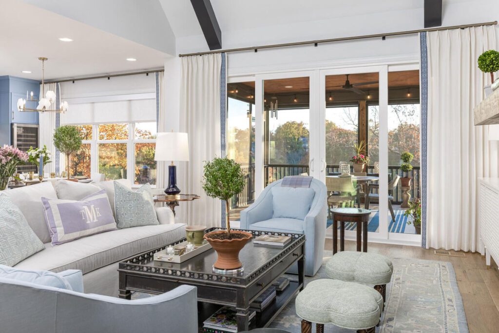 White custom drapery and sliding door curtains in a family room in Chattanooga
